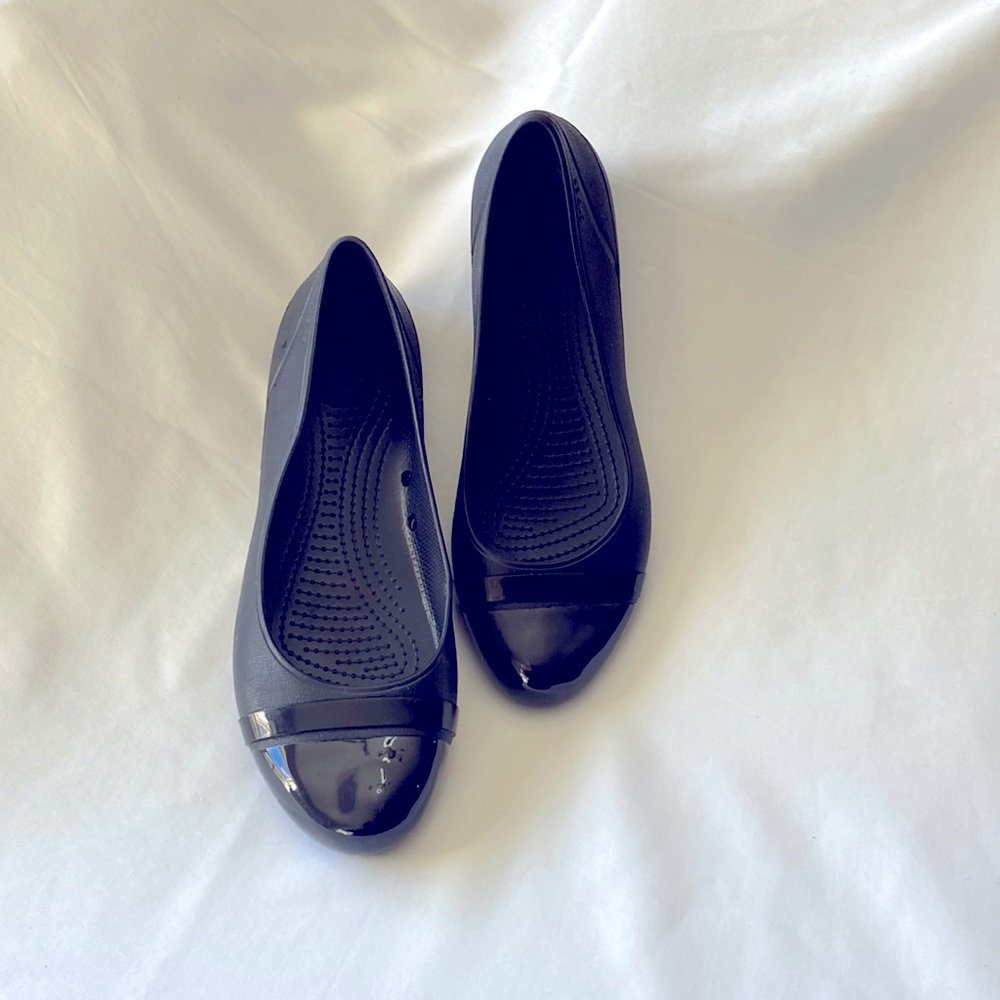 LADIE’S CROCKS; SIZE 10; JET BLACK SLIP-ON LOAFER STYLE. $20